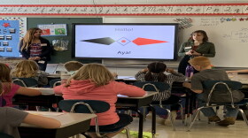 Miami art education majors Cas Napier, left, and Zania Hasty introduce Myaamia culture and imagery in a Talawanda classroom in October 2019.