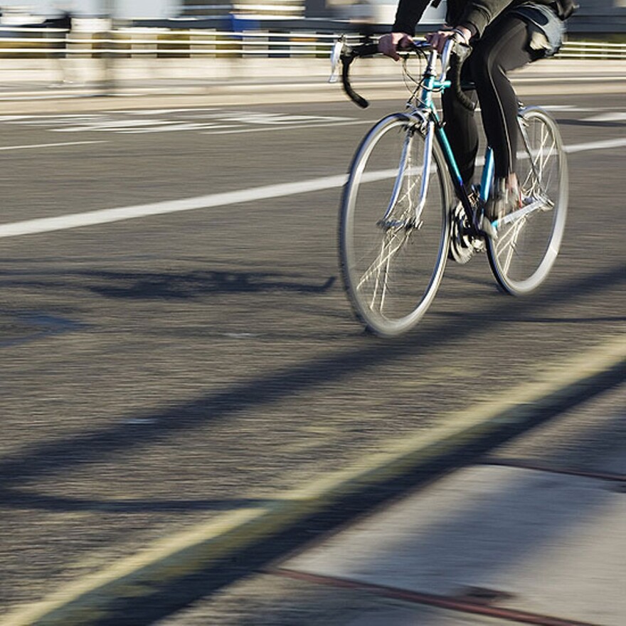 A cyclist on a city street.