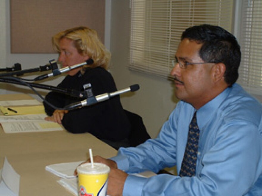 Municipal Judge Melissa Miller-Byrnes debates with Richard M. Jacquez in the KRWG studio.