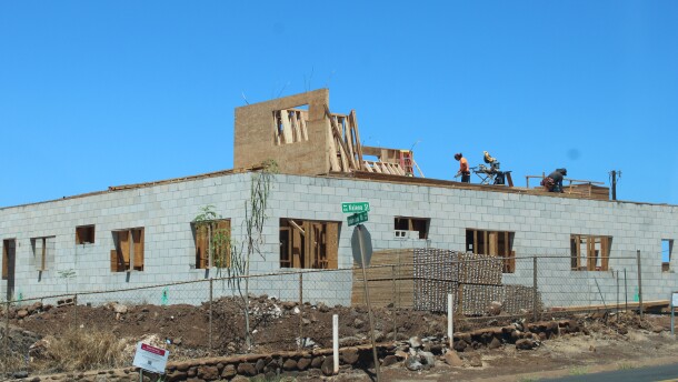 A structure is seen being rebuilt on Kalena Street in Lahaina, two years after the Maui wildfires. (Aug. 4, 2025)