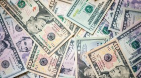 american paper money lays haphazardly