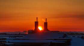 Sunrise on the North Slope behind the two new Parker drilling rigs. (Photo courtesy Kevan Dee)