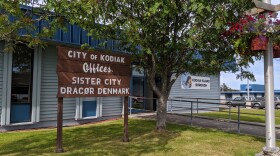 The City of Kodiak sign at the Kodiak Island Borough Building. (Photo by Kavitha George/KMXT)