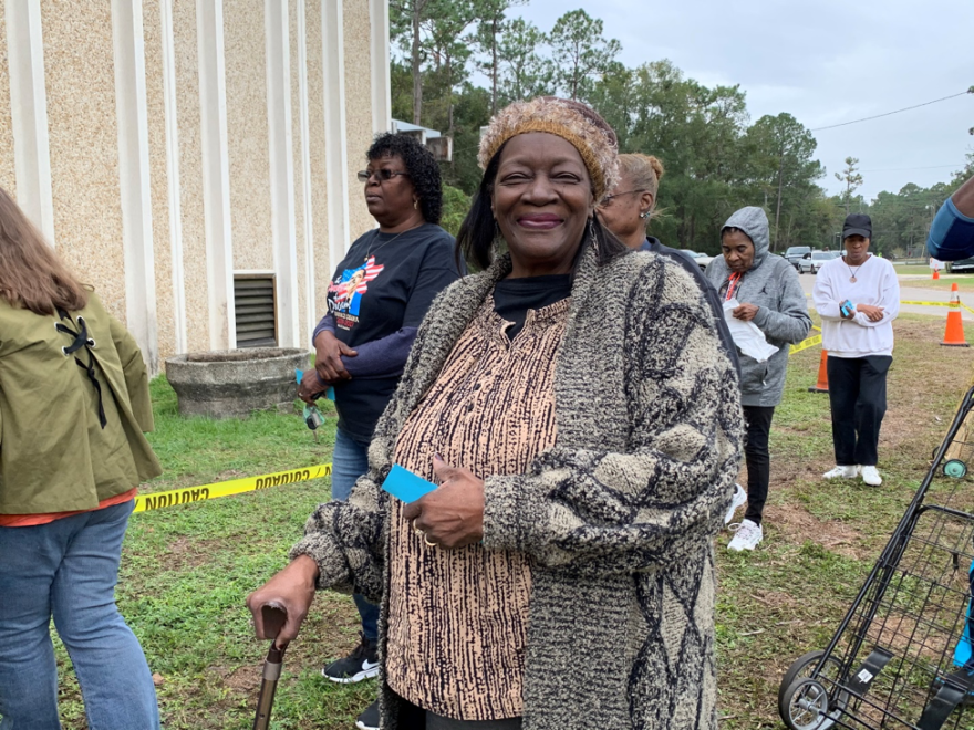 Janet Foster came for the second year in a row. She says getting the food allows her to contribute to her family’s Thanksgiving gathering. (Annaliese Linder/WUFT News)