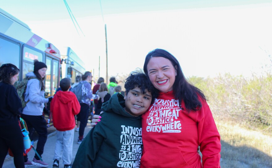 Kristina Welzien and her son attend their first MLK march.