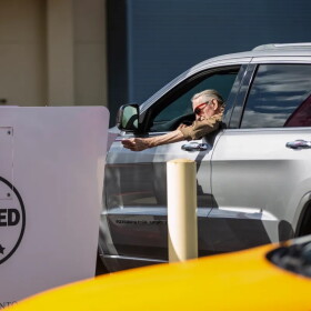 A voter casts their ballot at the Sacramento County voter registration and elections office in Sacramento on Nov. 7, 2022.