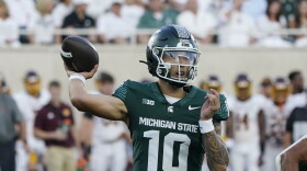 Michigan State quarterback Noah Kim passes during the first half of an NCAA college football game against the Central Michigan, Friday, Sept. 1, 2023, in East Lansing, Mich.