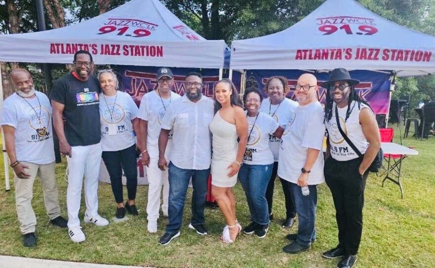 Performers Ragan Whiteside and PJ Spraggins with Team WCLK: Kerwin Sims, Morris Baxter, Cheryl Witherspoon, Joi John, Eugenia Ricks, James Locklin and Ray Cornelius.
