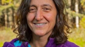 a portrait of a woman outside