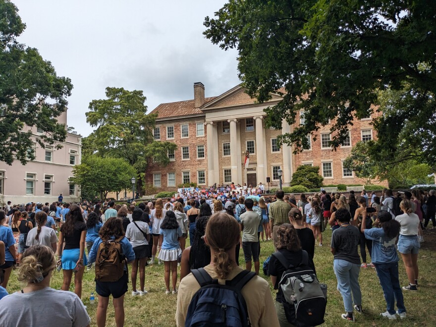 A large crowd standing outside of UNC's South Building to watch Wednesday's rally.