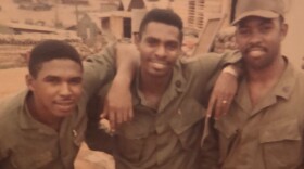 Wilbur Daniels Powell, known as "Dees" in service, stands with friends in Vietnam.
