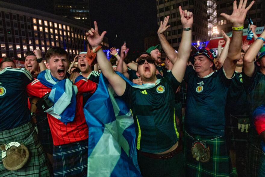 Scottish fans erupt as Scotland holds on to win their first game of the World Cup against Haiti 1-0 at the FIFA Fan Festival Boston at City Hall Plaza. (Jesse Costa/WBUR)