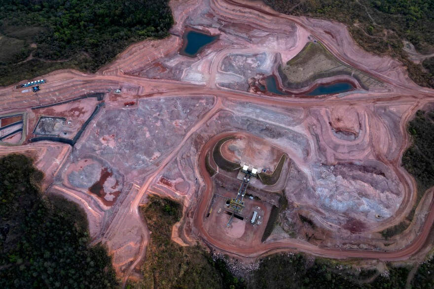 FILE - A mine operated by Serra Verde Mining digs for rare earth elements including neodymium, praseodymium, terbium and dysprosium, which are essential for the production of permanent magnets, in Minacu, Goias state, Brazil, July 28, 2025.