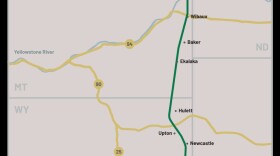 A map shows the proposed route for a pipeline to transport crude oil from Canada to Guernsey, Wyoming through eastern Montana.