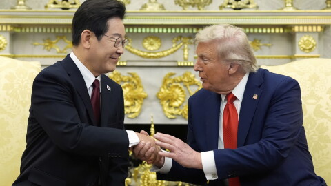 President Donald Trump, right, shakes the hand of South Korean President Lee Jae Myung during a meeting in the Oval Office of the White House, Monday, Aug. 25, 2025, in Washington. (AP Photo/Alex Brandon)