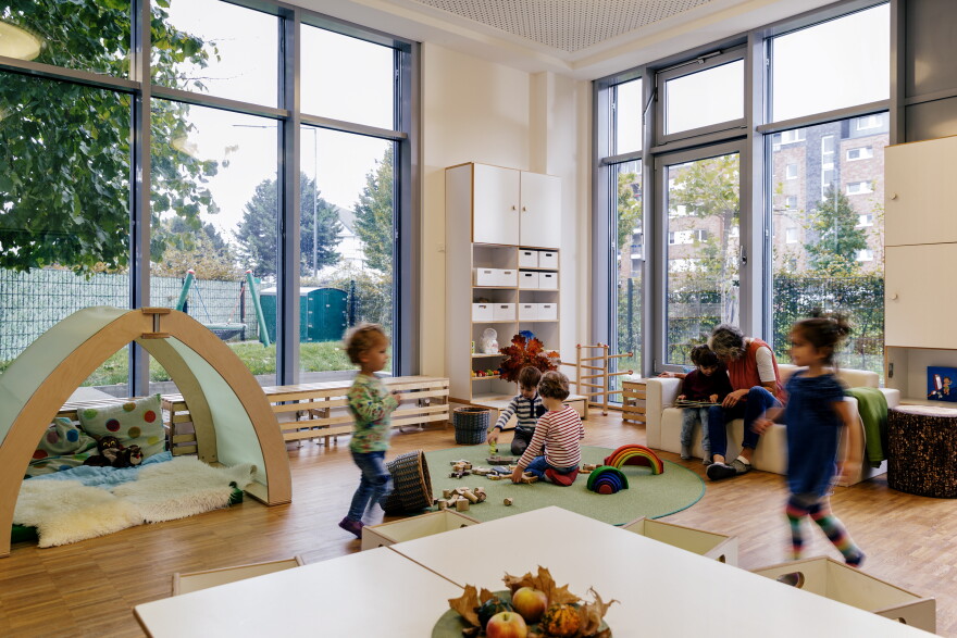 Children playing in the learning room at their daycare center.