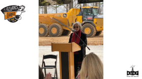 Founder and philanthropist Alice Walton addresses a large crowd assembled to celebrate construction start-up of her new medical school in Bentonville near Crystal Bridges Museum of American Art.