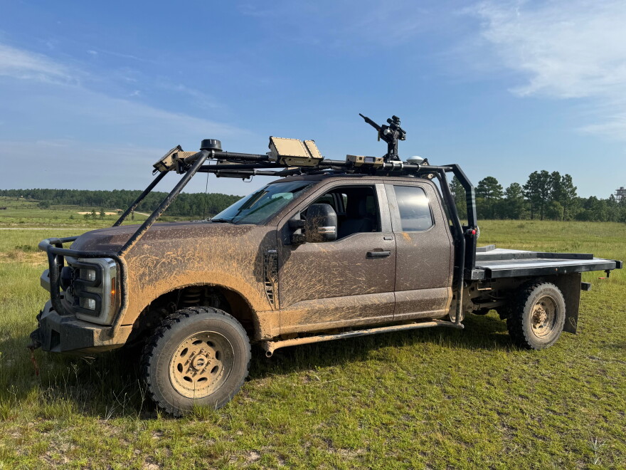 At Fort Bragg, N.C., soldiers demonstrated self-driving Ford pick-up trucks, equipped with automated weapon systems that can shoot down drones or cut paths through minefields.