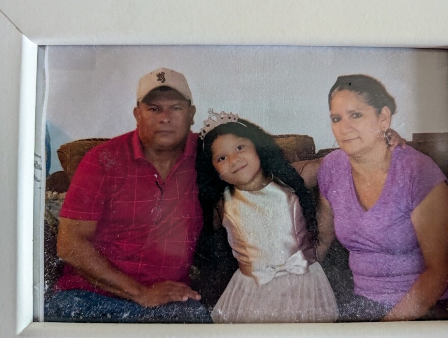 A photo of Boanerges Flores-Bravo, Alba Del Socorro Matamoro-Hernandez and their 8-year-old daughter Mauren Flores Matamoro.