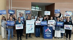 Health care advocates gather at the Monterey County Government Center in Salinas on Thursday to launch a statewide campaign calling for action to address rising medical costs.