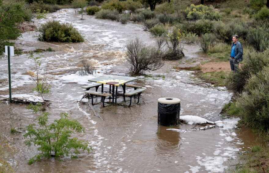 Floodwaters cover a picnic area at the Arroyo Hondo Open Space in Santa Fe on Tuesday, Sept. 29.