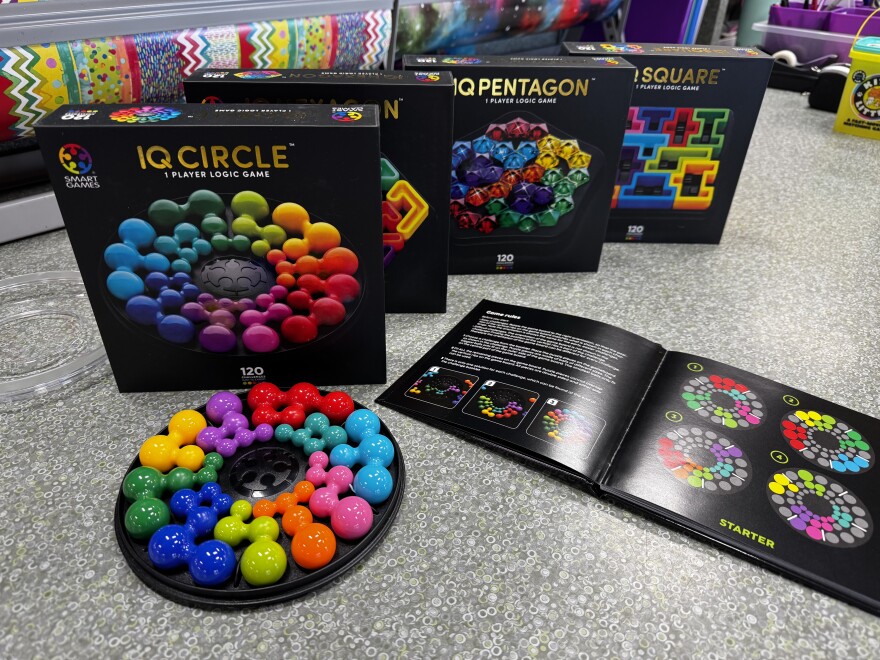 IQ Circle and its variants — IQ Square, IQ Hexagon and IQ Pentagon — challenge one or more players to fit all the pieces onto the plastic game board.