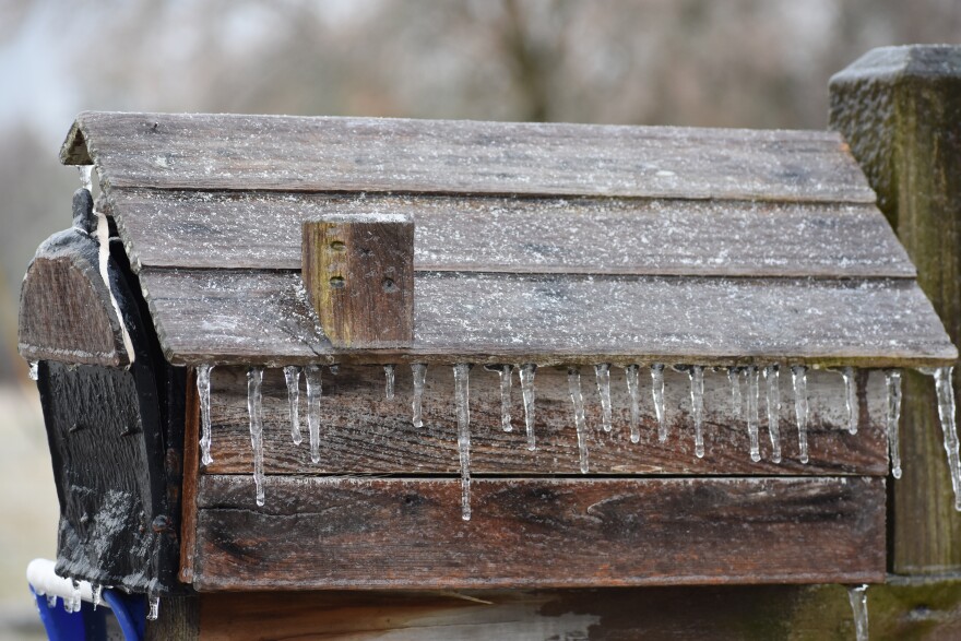Ice covers a mailbox on a cold winter day (file)