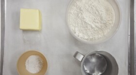 To make a flaky pie crust, start by measuring out 12 ounces (by weight) flour, 8 ounces firm butter, 4 ounces ice water. Keeping it cool is key.