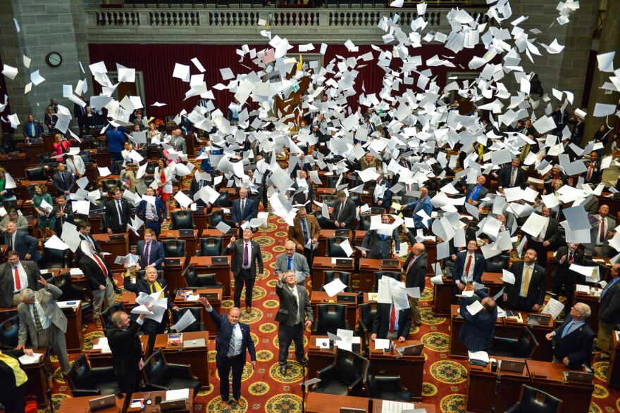 MIssouri House legislators mark the end of the session by ceremonially tossing  papers Friday afternoon