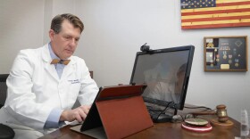 George Monks, a Tulsa dermatologist and former president of the Oklahoma State Medical Association, in his office Dec. 30, 2025.