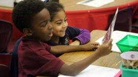 Kindergarten students Gregory Antoine and Kaylee Monteagudo at AIE Charter School in Miami Springs. Charter schools in Miami-Dade want to share in money from a recently approved tax increase.