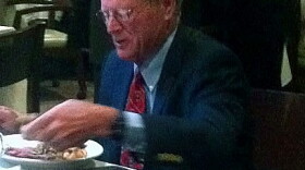 Senator Inhofe eats breakfast before speaking at the Tulsa Press Club.