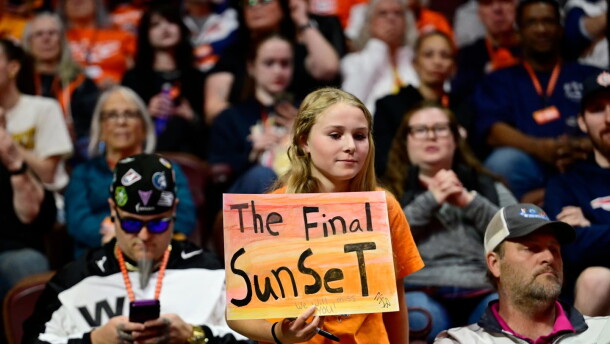 A fan holds a sign in the first half of the Connecticut Sun and Toronto Tempo game.