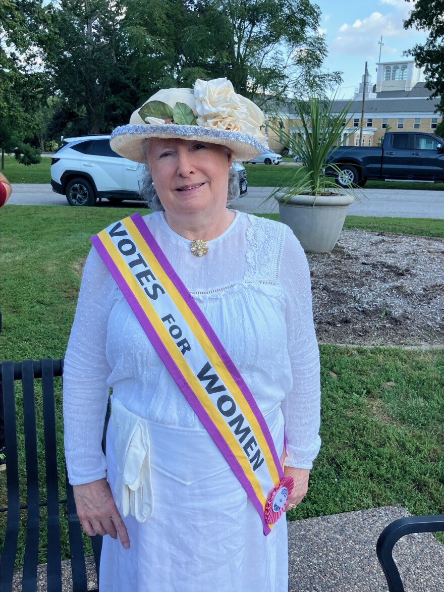 Susan Leabhart of Davenport at the Women's Equality Day protest in Vander Veer Park Wednesday, Aug. 26, 2026.