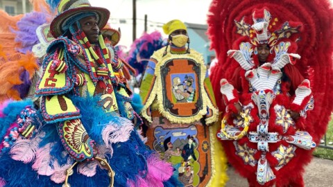 Mardi Gras Indians gather outside Treme Recreation Community Center, play music, and chant as they wait for the funeral services of Keelian Boyd, or “Big Chief Dump”, to end, April 10, 2021.