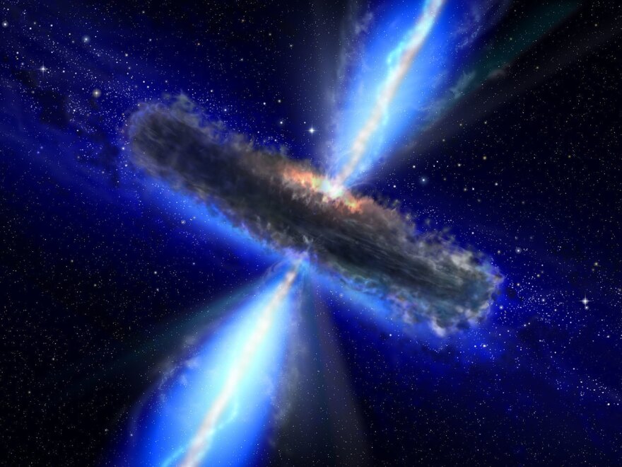 This artist's impression shows the dust torus around a super-massive black hole. Black holes lurk at the centers of active galaxies. The jets emanating from the black hole send neutrinos hurtling into space.