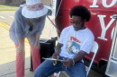 A League of Women's Voter volunteer helps a CSU sophomore register to vote in the Nov. 2025 General Election. The group is visiting more than 25 Ohio colleges to register students and all eligible adults.