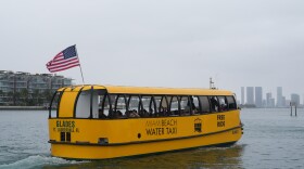 The Miami Beach Water Taxi travels from Miami Beach to the city of Miami, Wednesday, Jan. 21, 2026.