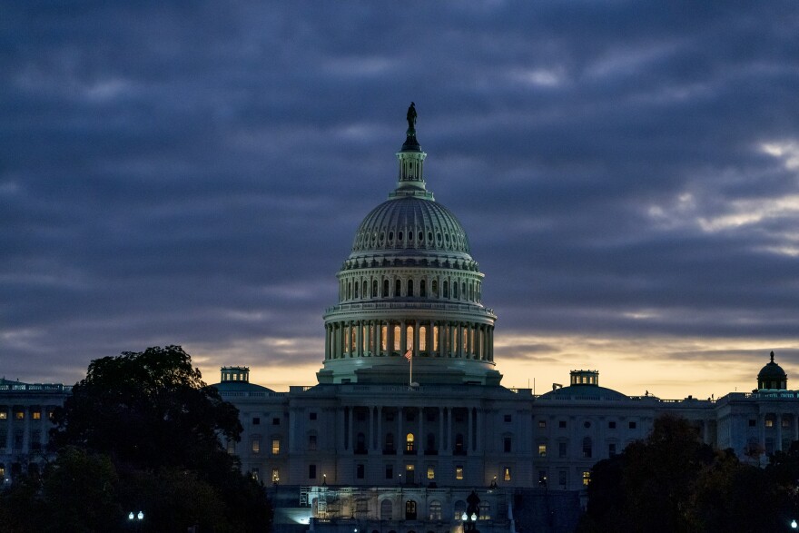 The Capitol is seen at dawn on the morning after Speaker Nancy Pelosi, D-Calif., announced the House of Representatives will vote on a resolution to affirm the impeachment investigation, in Washington, Tuesday, Oct. 29, 2019.