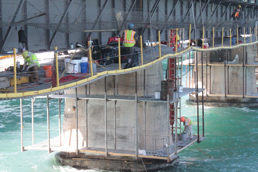 The crews working on the bridge project built a platform underneath the original girder to provide access and limit impact on the seabed beneath the bridge.