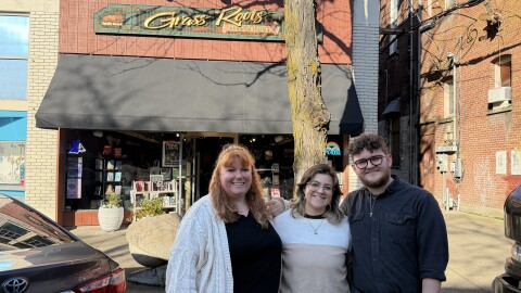 Amber Hamilton, Jay Enghauser and Brandon Enghauser stand outside of Grass Roots Books and Music in Corvallis on Feb. 25, 2026.