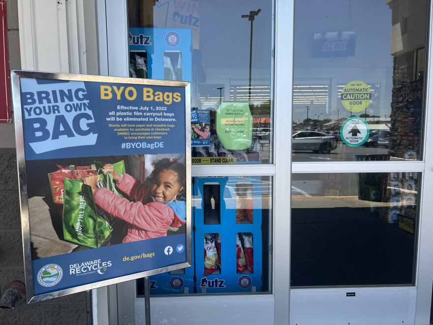 An ACME in Smyrna posts signage informing customers of the new law, banning plastic bags from grocery stores.