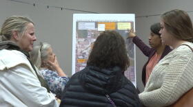 Franklin residents talk with officials at the Environmental Protection Agency about the contamination at an open house on Dec. 3.