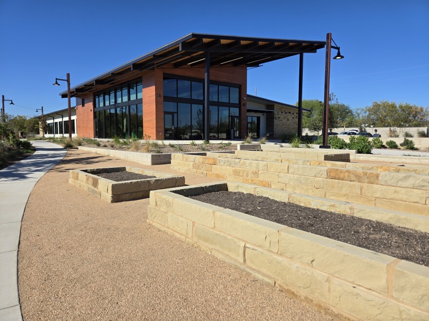 The main county farm office with some of the 30 raised garden beds in front of it as pictured on Dec. 11, 2025