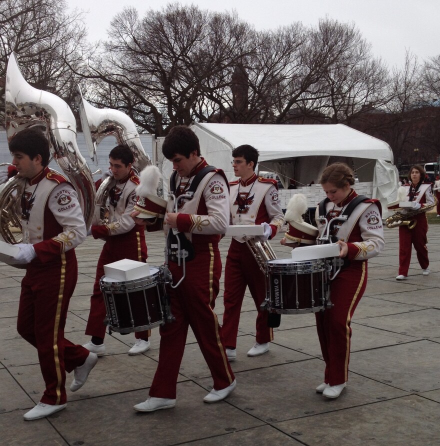 The Boston College marching band tunes up prior to performing along the National Mall.