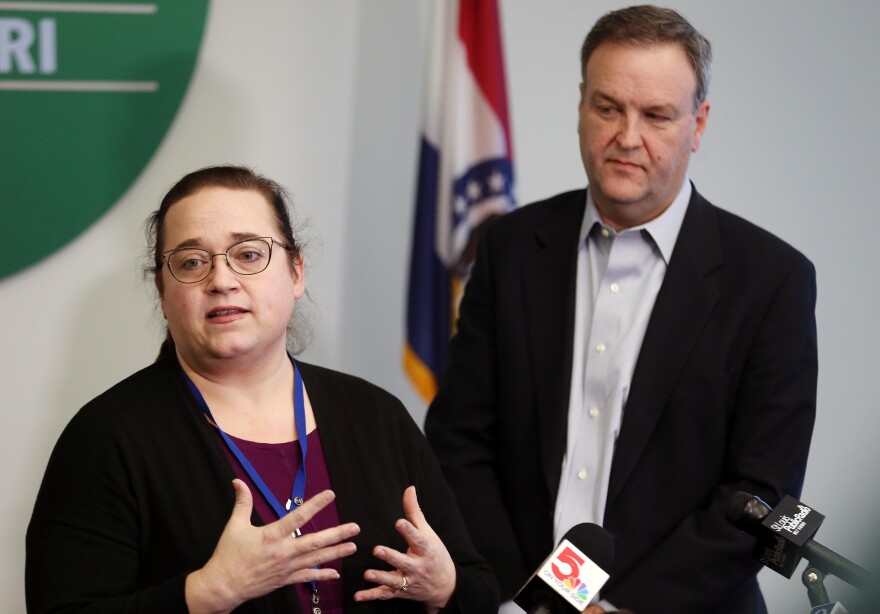 St. Louis County Health Department co-director Spring Schmidt (left) and county executive Sam Page address reporters on Sunday, March 8, 2020, regarding Missouri's presumed first case of the new coronavirus.