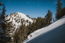 A skier on terrain that will soon be accessible via the DMI chair lift at Powder Mountain. The new chair is scheduled to open for the 2026-2027.
