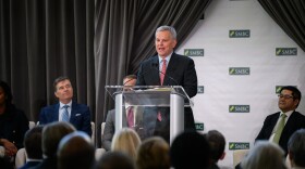 Gov. Josh Stein speaks in Charlotte on Tuesday, April 7, where Japanese bank SMBC Group has chosen the city for its second U.S. headquarters, bringing about 2,000 jobs and a $50.5 million investment.