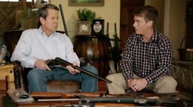 Brian Kemp, Georgia's secretary of state, holds a gun as he talks to a young man in one of his ads for his campaign for governor. It has spurred national outrage.
