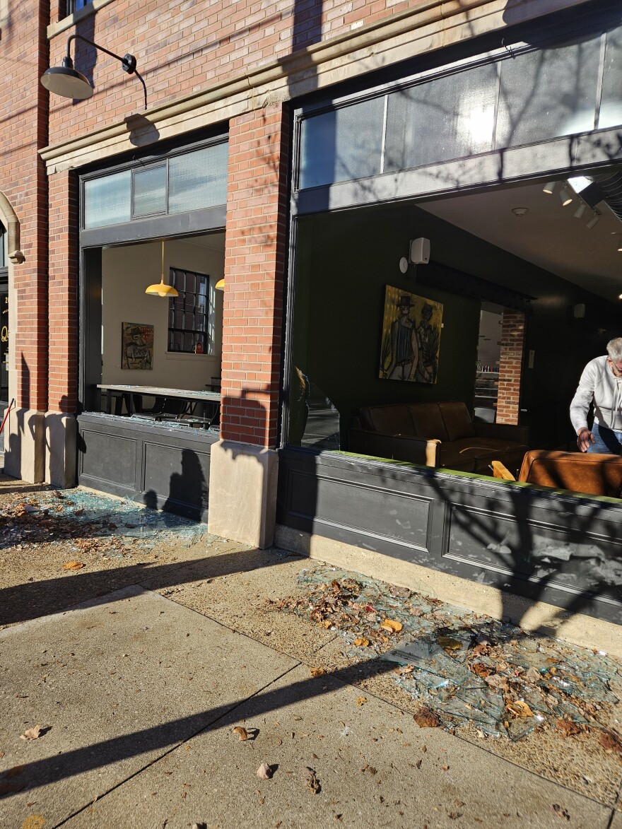 A coffee shop with shattered windows.